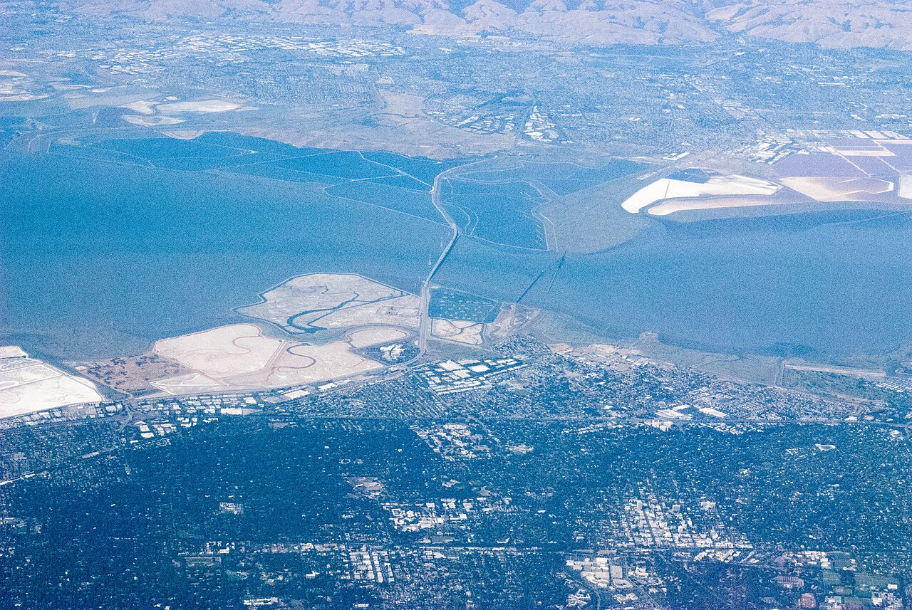 Also the Cargill salt flats, former salt flats now returning to wetlands, Coyote Point park at the North East end of the bridge (top), and Facebook World Headquarters, in the curve